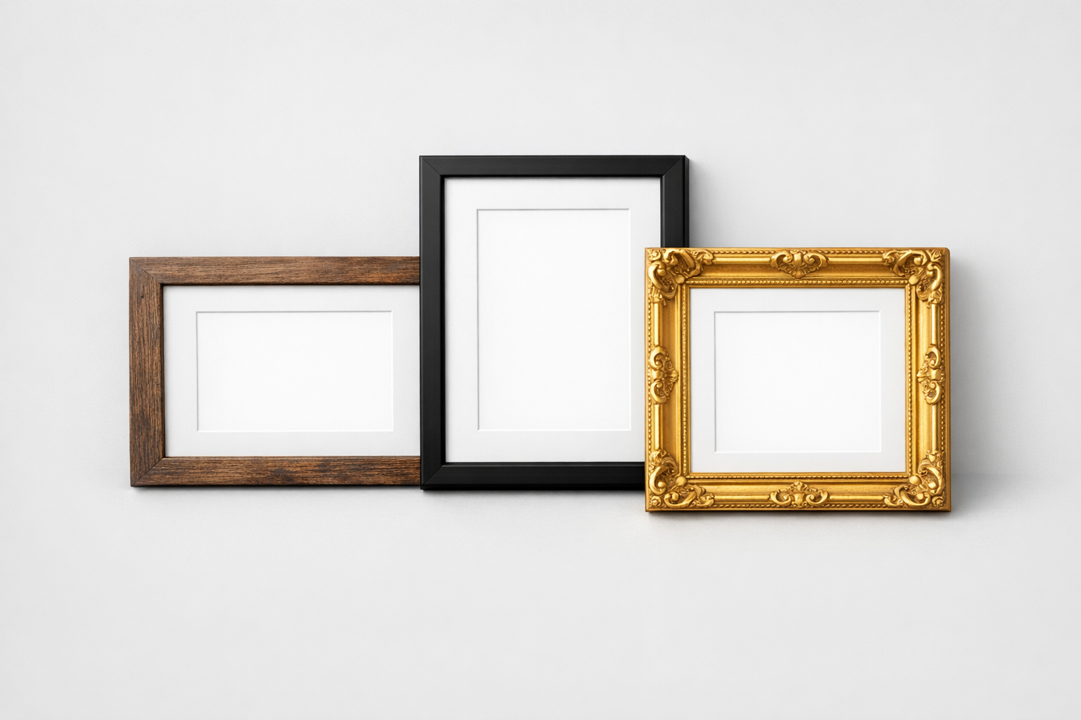 Three picture frames in different styles: rustic wood, modern black, and ornate gold